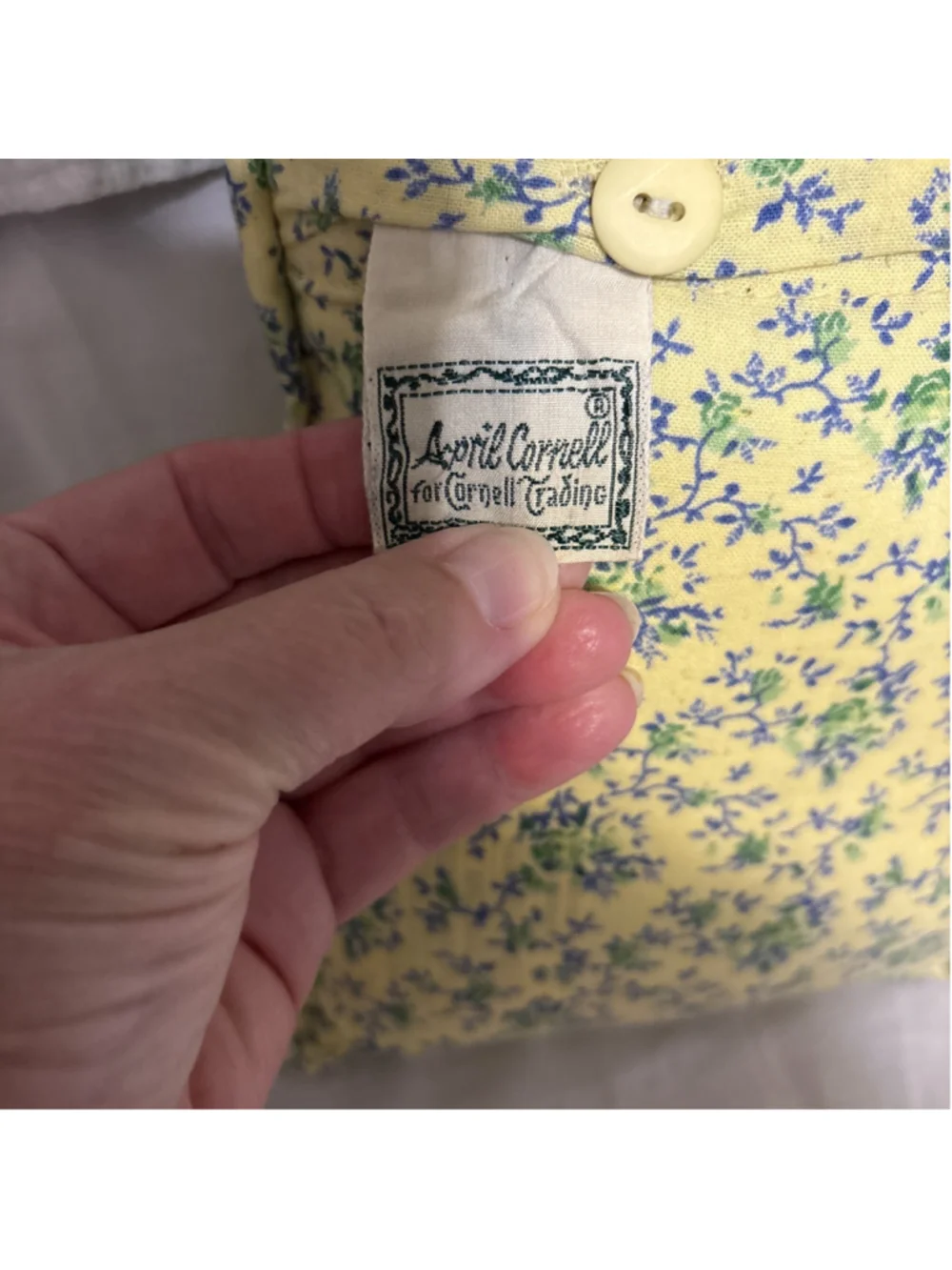 April Cornell Sweet Floral Green Plaid 12”x8” Pillow. Says “Girl Friend” On It.